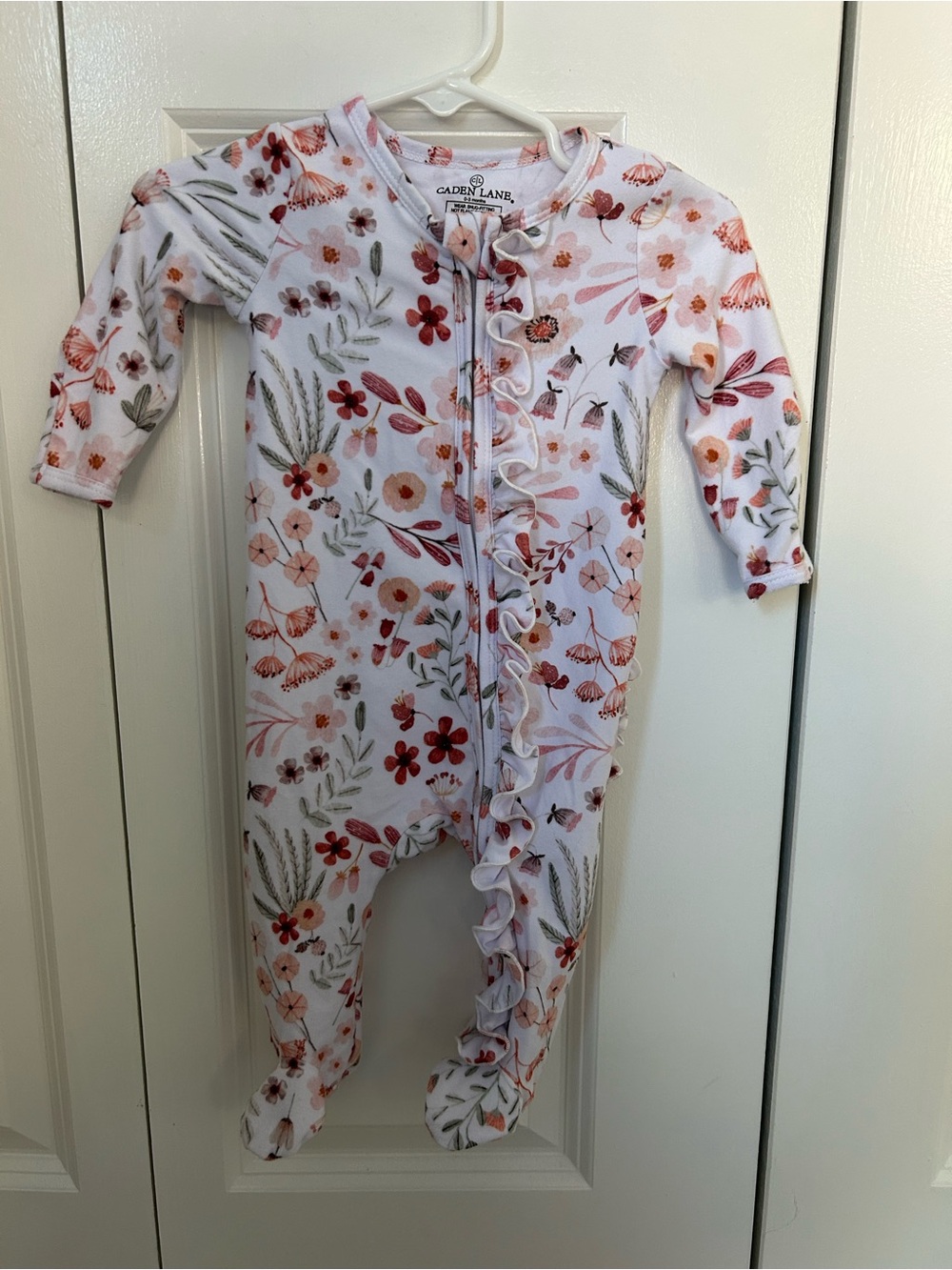 Caden Lane 0-3 month full zip Ruffle footie sleeper white with floral pattern